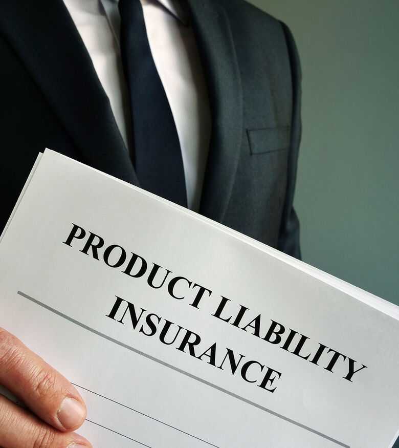 Product Liability Lawyers in Sarasota, FL - Man holding product liability papers