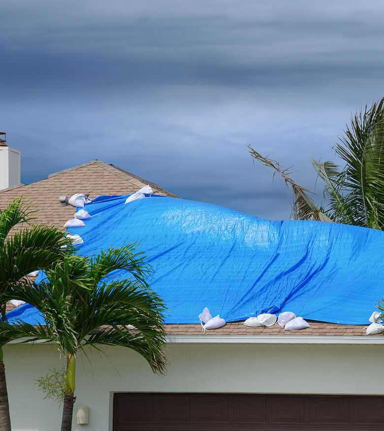 Hurricane Claims Lawyers in Macon, GA - Covered Roof during hurricane