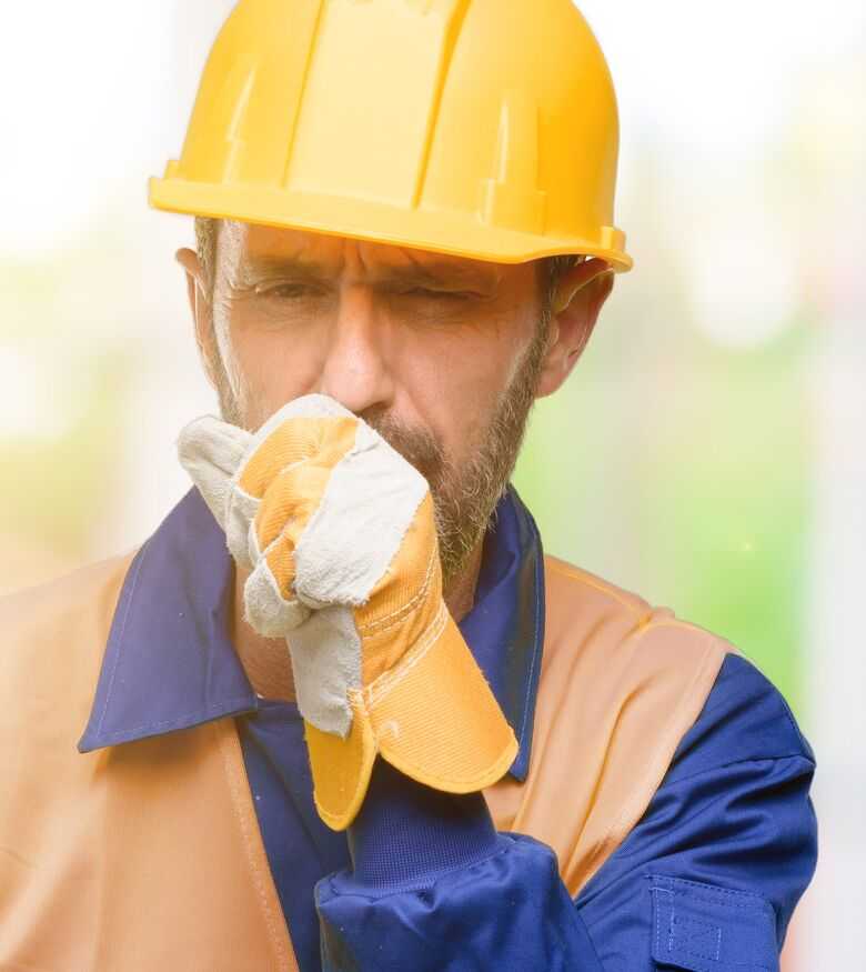 St. Augustine Mesothelioma Lawyers - construction worker coughing from asbestos