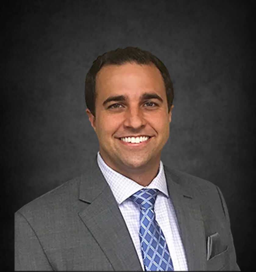 Headshot of Gregory R. Schmitz, an Orlando-based labor and employment lawyer at Morgan & Morgan