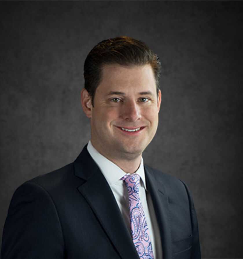 Headshot of Damien H. Prosser, an Orlando-based breach of contract lawyer at Morgan & Morgan