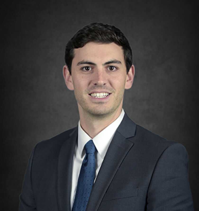 Headshot of Grant Dostie, a Tampa-based car accident and auto injury lawyer at Morgan & Morgan