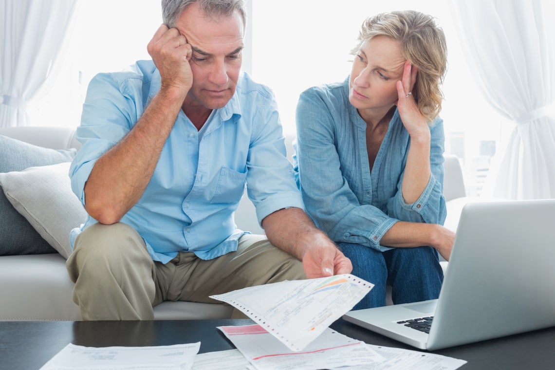 Couple looking at bills