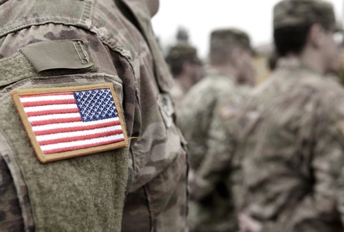Do I Qualify for a Claim if I Am Not a Veteran - veteran with flag