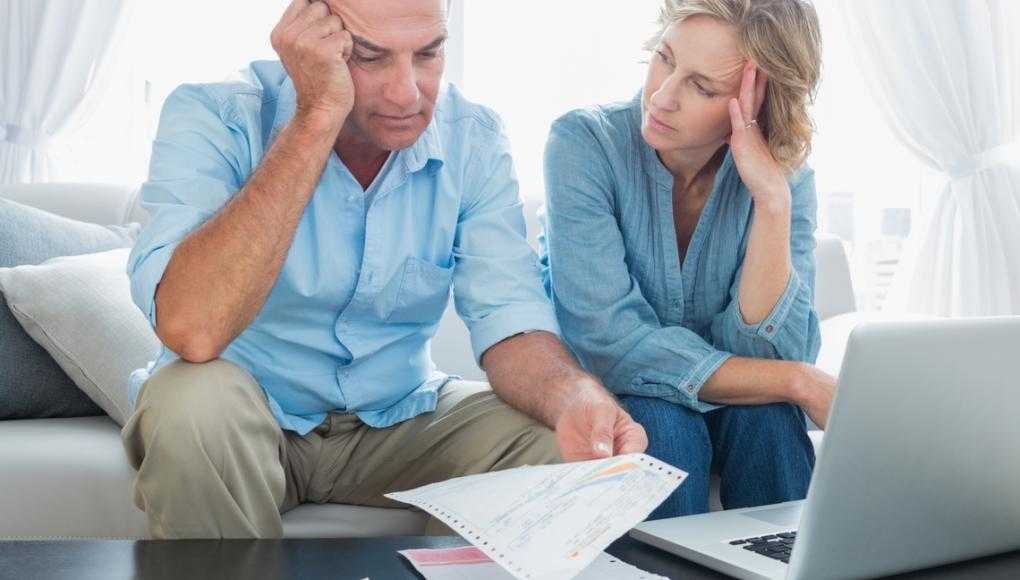 Couple looking at bills
