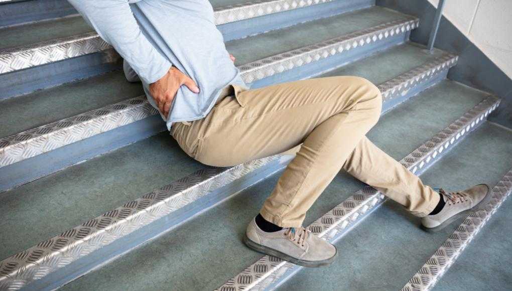 person slipping down stairs