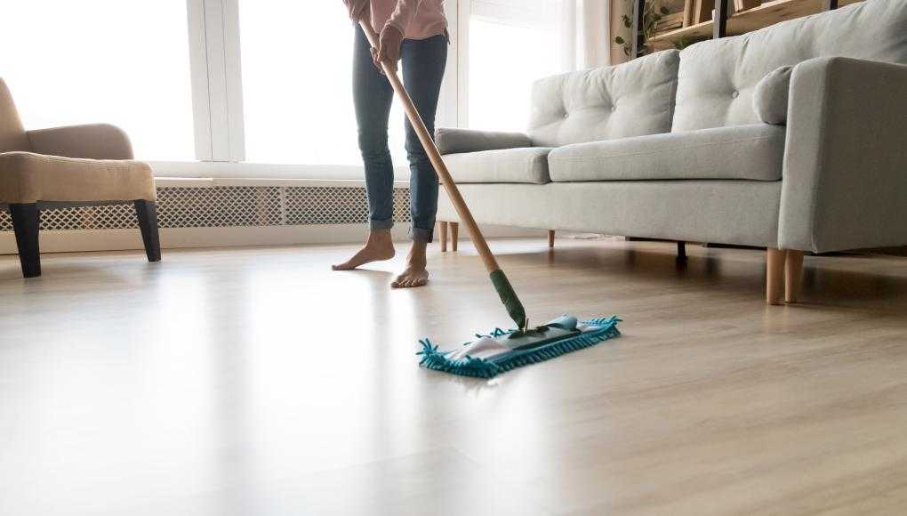 Woman mopping the floor