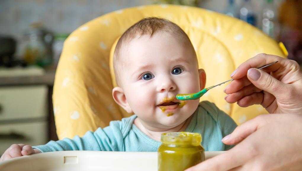 Baby being fed 