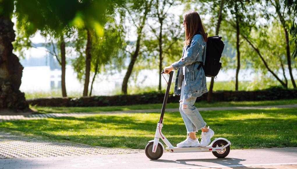 Woman riding an electric scooter