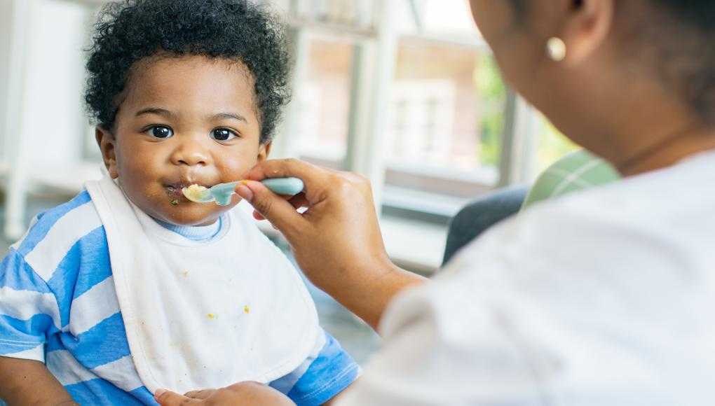 Baby being fed