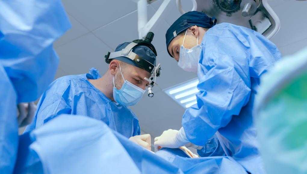 Doctors performing surgery