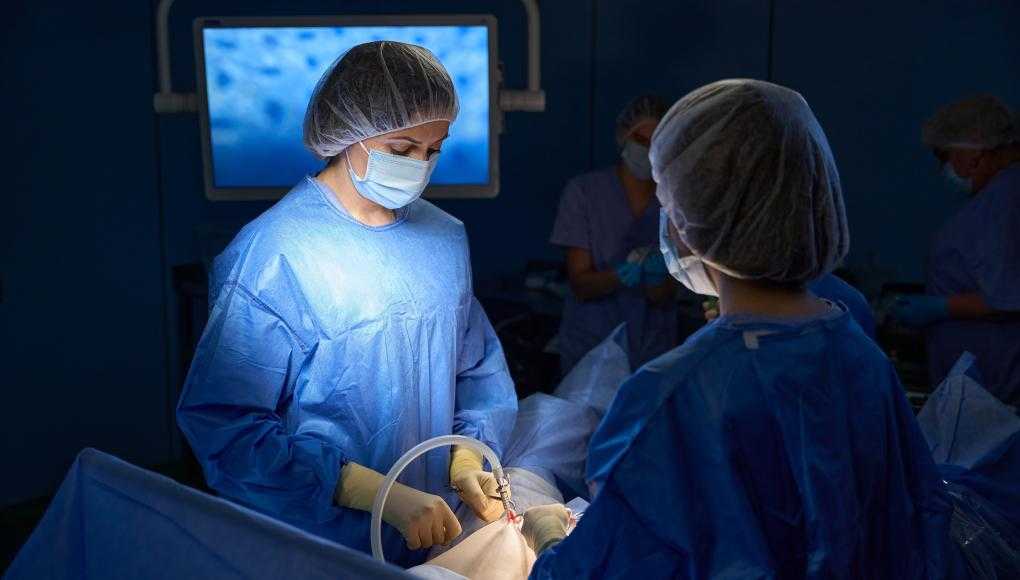 Doctors performing surgery