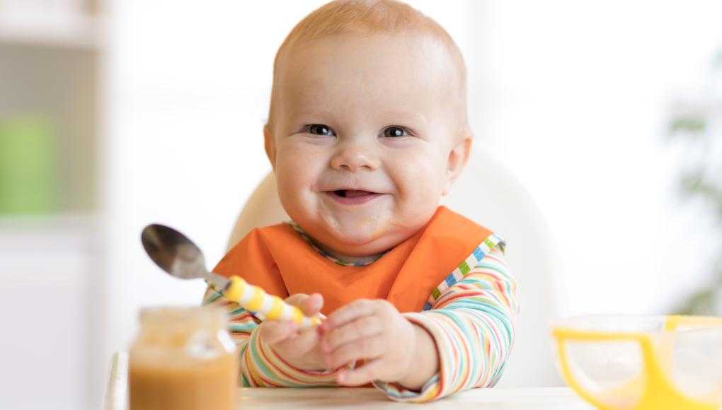 Baby eating baby food