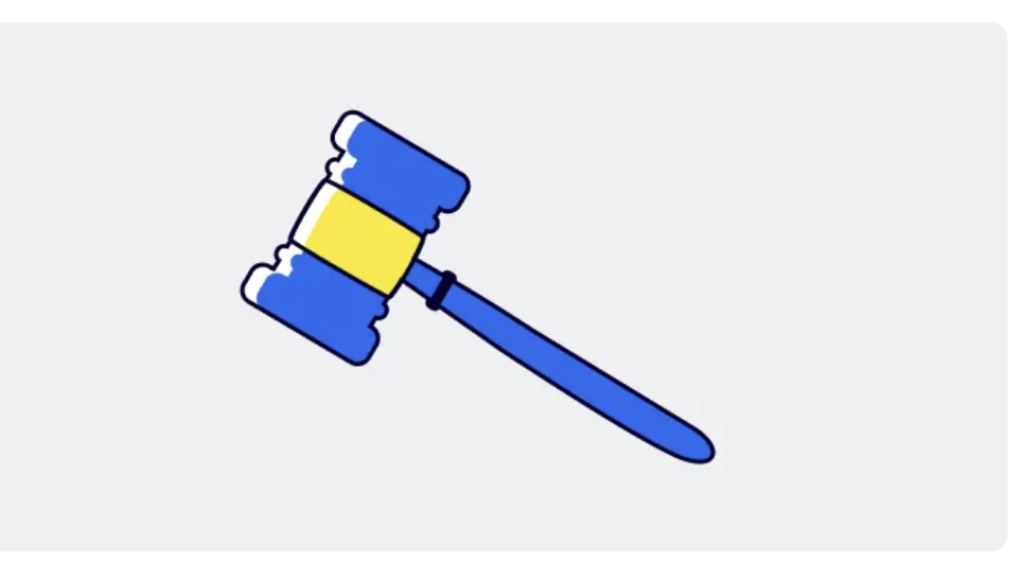 graphic of a blue and yellow color gavel on a grey background 