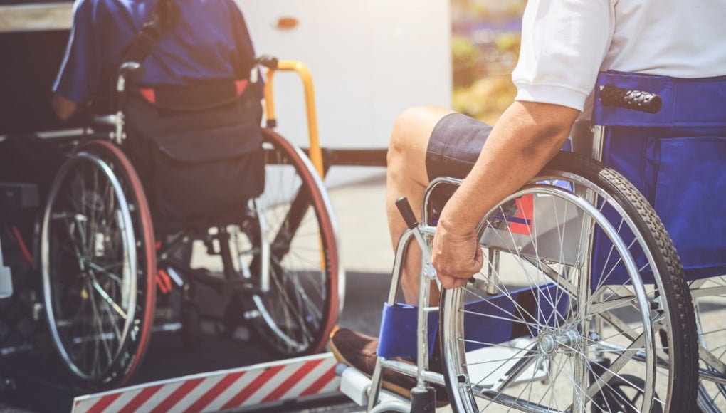 wheelchairs onto the bus