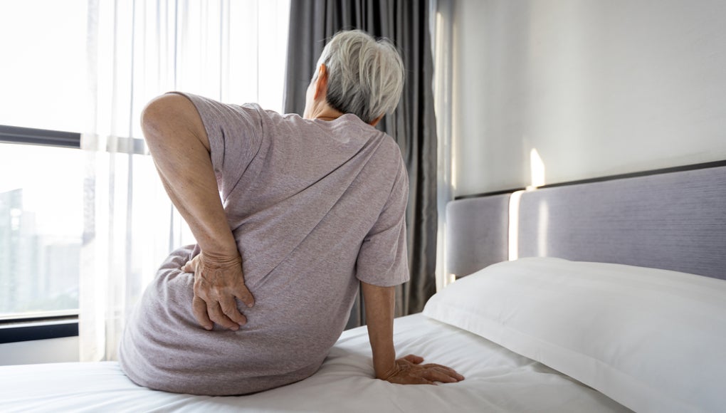 elder man with back pain