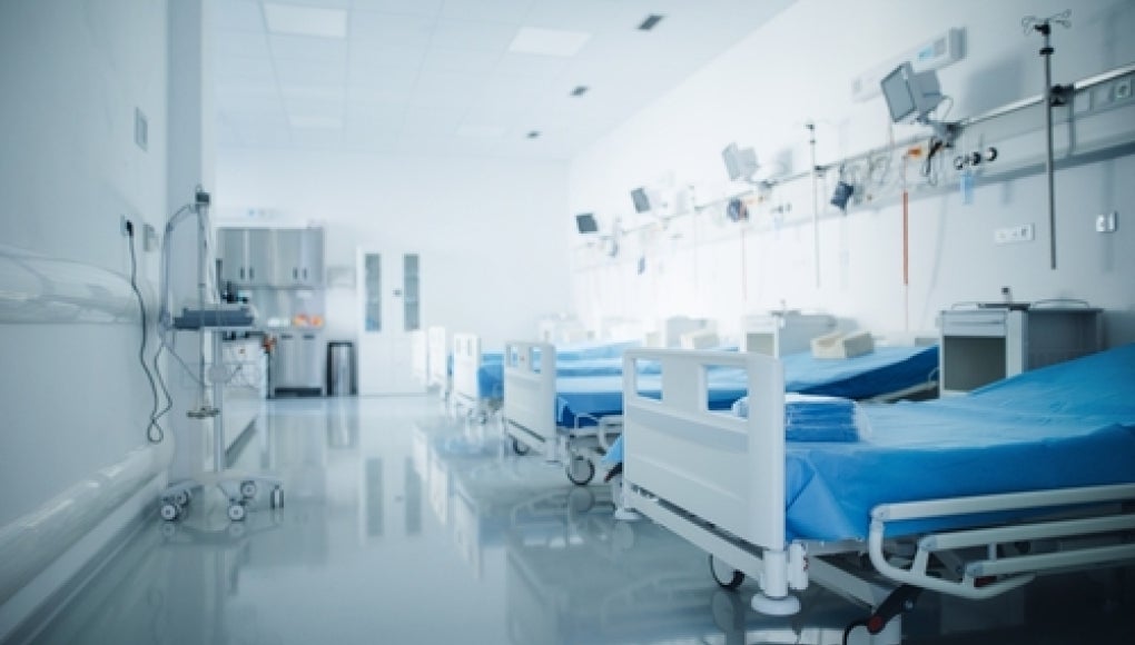empty hospital room with multiple empty beds