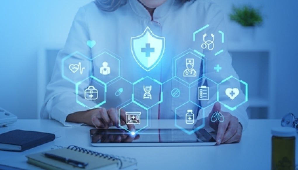 doctor using ai-powered futuristic tablet for medical 