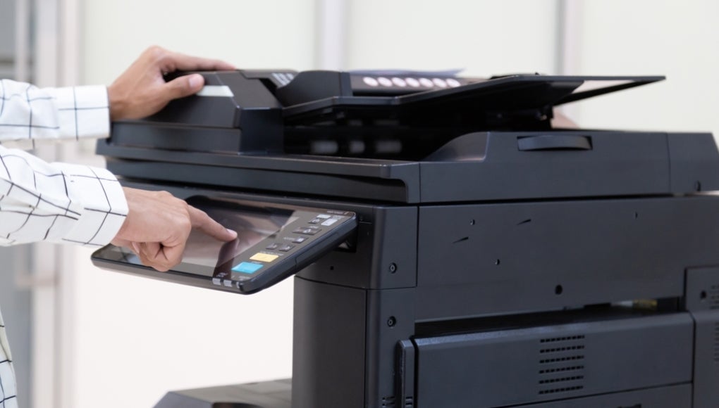 Someone using a printer