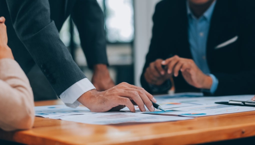 employees working around computers
