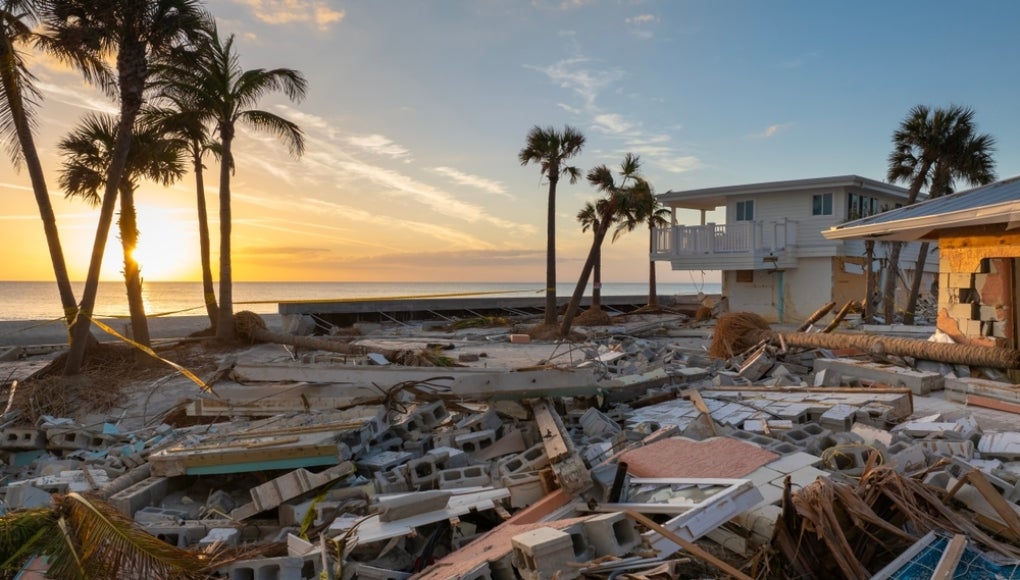Destroyed houses on ocean coast. Hurricane Milton consequences in Englewood, Florida. Storm surge severe damage