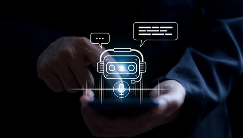 person holding a tablet with a ai chatbot floating above it staring at the user 