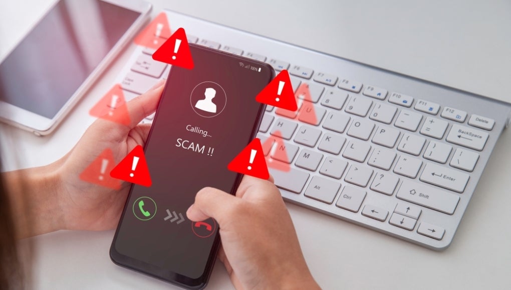 Warning against phone scams, It highlights the need to be wary of unknown callers and suspicious messages. Emergency warning alert alarm on Smartphone, Technological vulnerability.