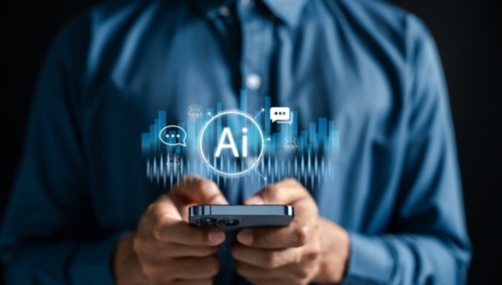 person holding phone with floating AI symbol and soundwave glowing above the phone
