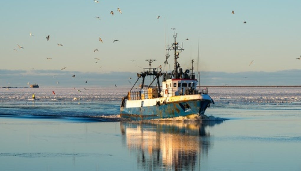 commercial fishing ship at sea 