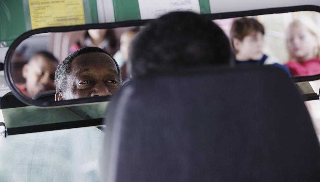 The Safety Rules for Atlanta School Bus Drivers That Parents Should Know - The school bus driver glanced at the rearview mirror