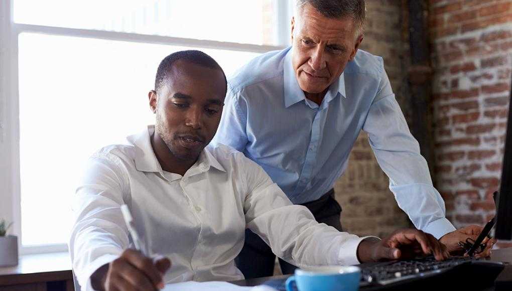 Man explaining to another man