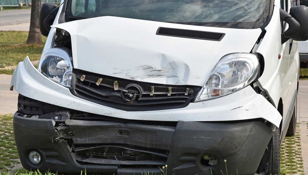 Record-Setting Rower Killed in Team Van Crash - Wrecked white Van