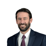 Headshot of Ian Boettcher, a Fort Lauderdale-based premises liability and slip and fall lawyer at Morgan & Morgan