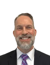 Headshot of Douglas Price, a Providence-based personal injury lawyer from Morgan & Morgan