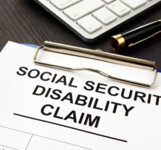 social security disability claim form on a clipboard