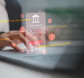 person logging into bank account with red warning signs popping up