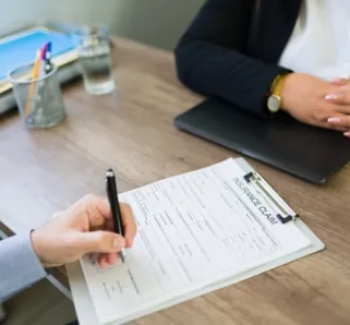 two people reviewing insurance form