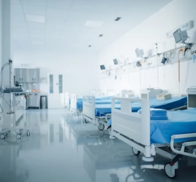 empty hospital room with multiple empty beds