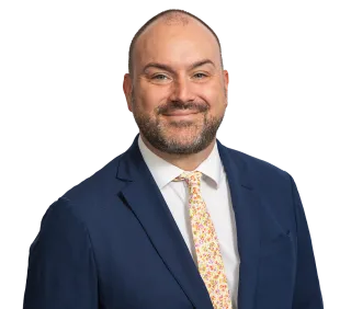 Headshot of ATTORNEY Dan Watts, a New York-based personal injury lawyer from Morgan & Morgan