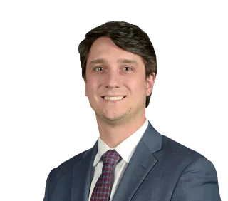 Headshot of William Daniel Bates, an Orlando-based personal injury lawyer at Morgan & Morgan