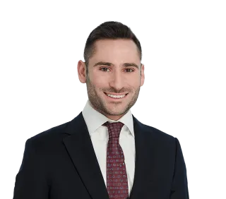 Headshot of Aaron Zimmerman, a Brooklyn-based personal injury lawyer at Morgan & Morgan