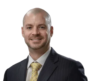Headshot of Andrew Boughrum, a New York City-based personal injury lawyer at Morgan & Morgan