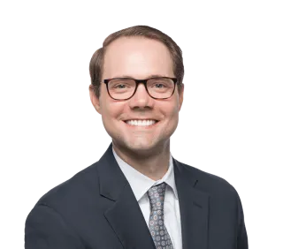 Headshot of Blake Fluevog, an Alpharetta-based car accident and auto injury lawyer at Morgan & Morgan
