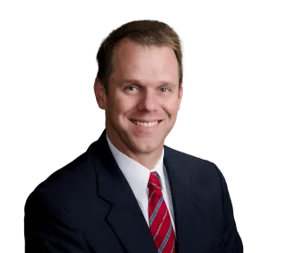 Headshot of Christopher Mank, a Lakeland-based personal injury lawyer at Morgan & Morgan