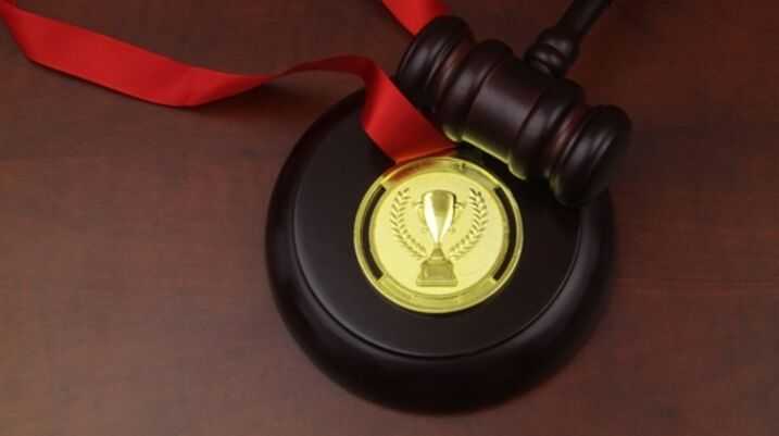 Nine Morgan & Morgan Attorneys Listed in Best Lawyers in America - Gavel and medal