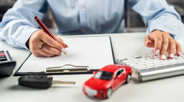 On the Road with Confidence: A Deep Dive into Rental Car Insurance - signing insurance forms