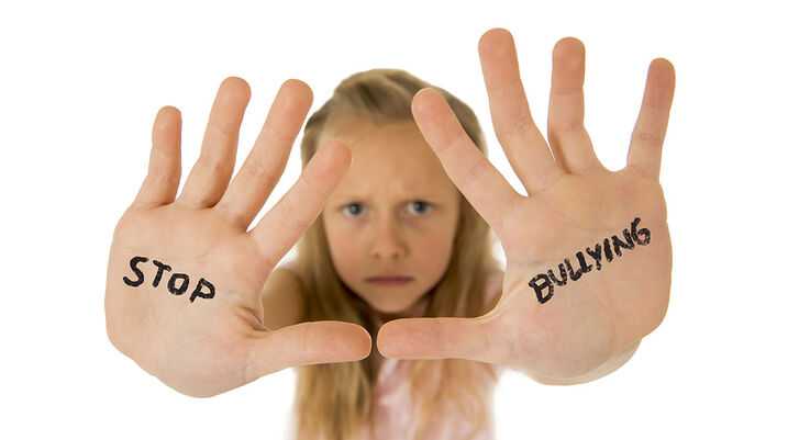 Rebecca Sedwick's Mother Represented by Morgan & Morgan - A girl writes "Stop Bullying" on her hand