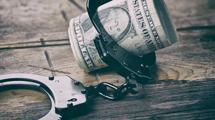 Money in handcuffs