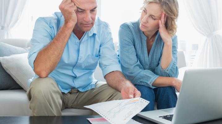 Couple looking at bills