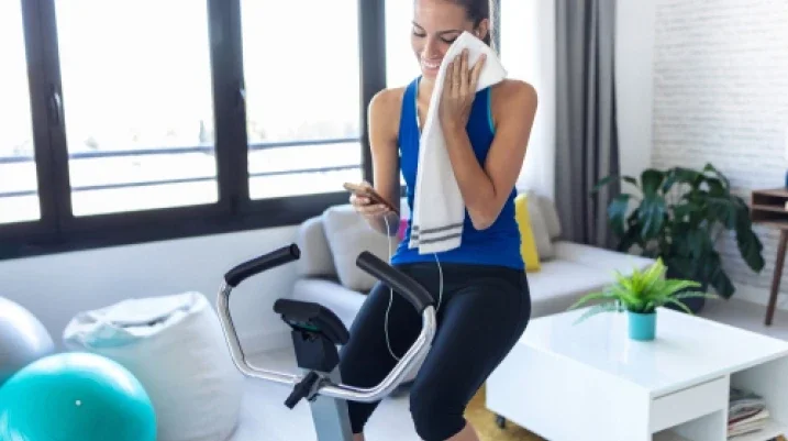 Peloton Recalls 2.2 Million Bikes - lady on a bike